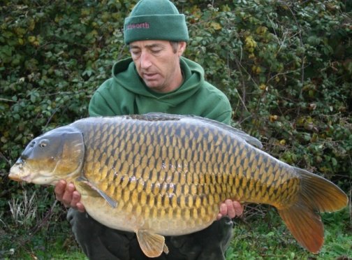 Martin Clarke catching a big common!